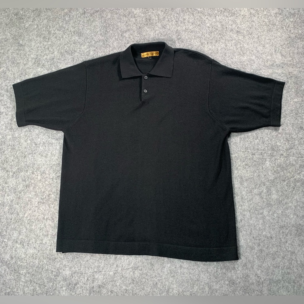 Classic black knit top with gold satin label